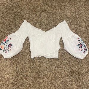Boutique white and floral stretchy size medium flowy top